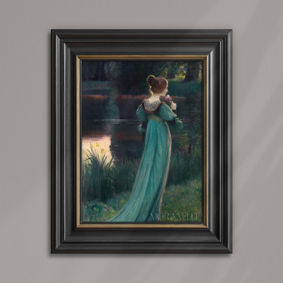 Woman in a long, light teal dress standing by a pond with a flower in her hand.