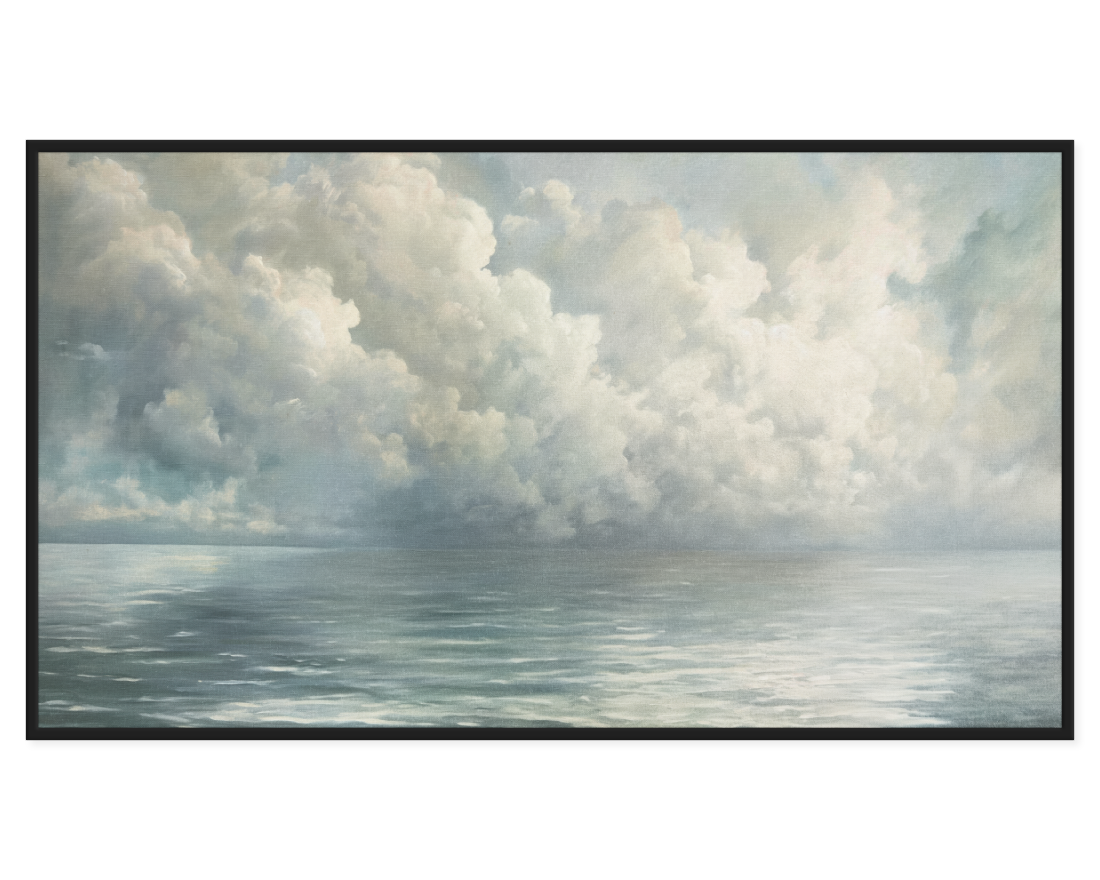 Framed artwork of a landscape with clouds and water.