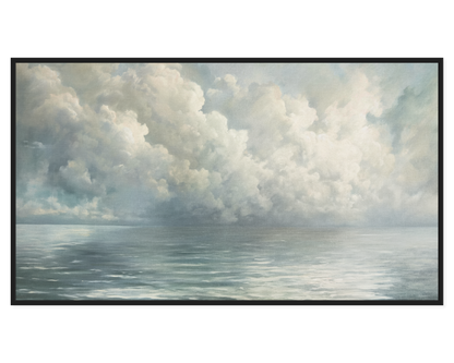 Framed artwork of a landscape with clouds and water.