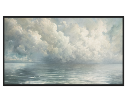 Framed artwork of a landscape with clouds and water.