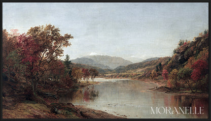 Autumn landscape with a river, colorful trees in red and orange, and distant mountains reflected in calm water.