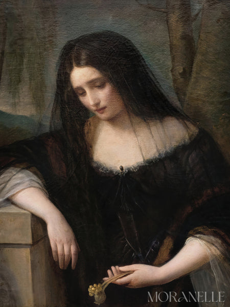 Portrait of a woman in a dark dress holding a flower