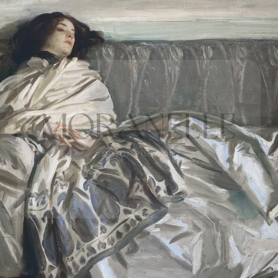 Slow slide showcasing the serene scene of a woman resting on a couch.